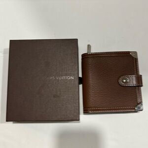 Louis Vuitton cuir suhali brown bifold wallet coin & 5 card slots. Serial#MI0027